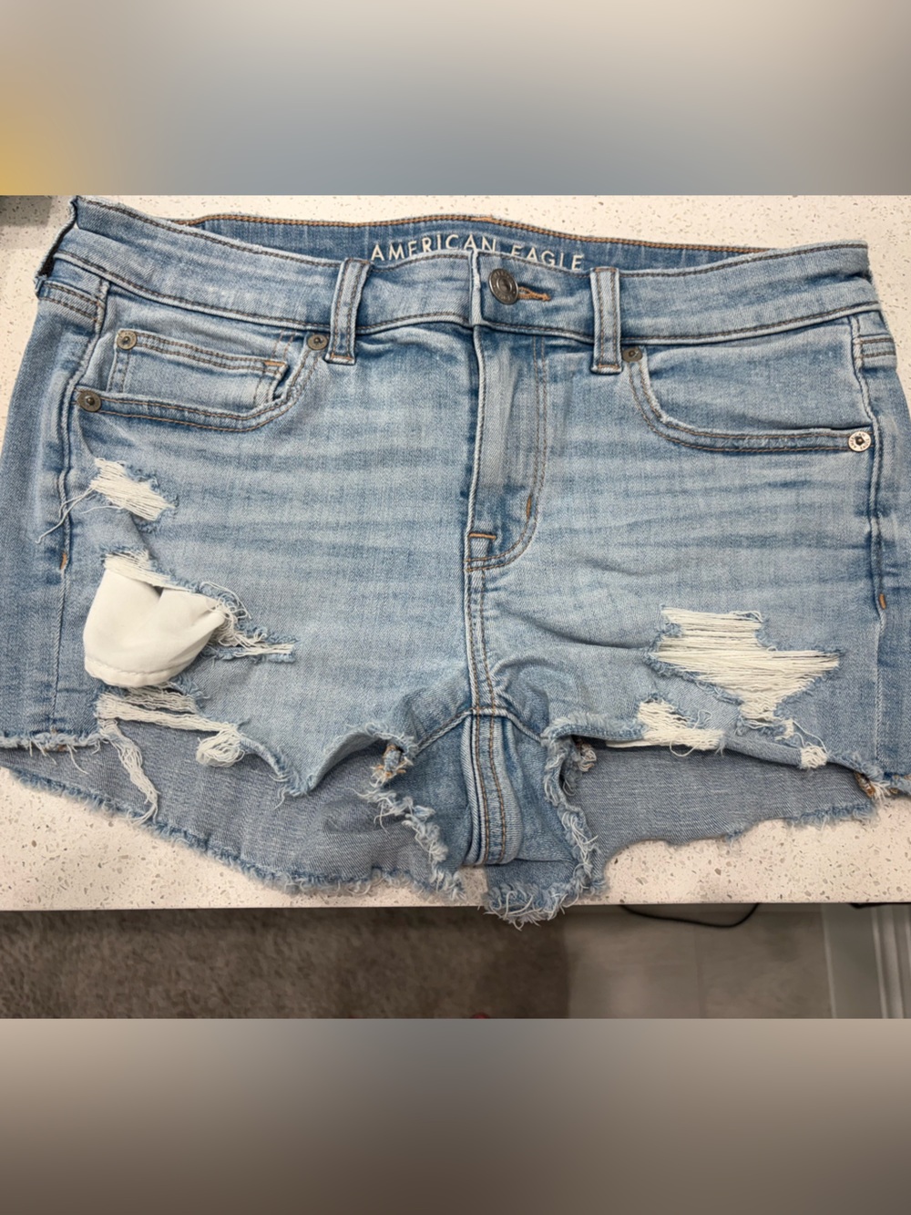 Light Wash Distressed Denim Shorts